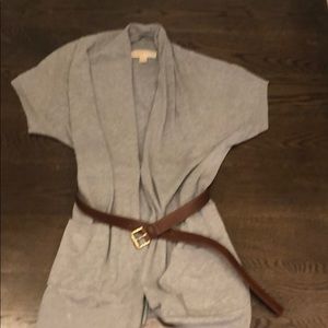Michael Kors belted grey sweater.